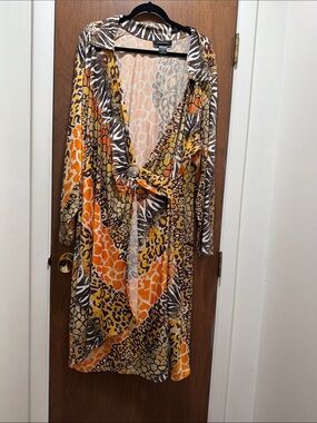 Ashley Stewart Long Sleeve Animal Print Wrap Dress in Orange and Brown